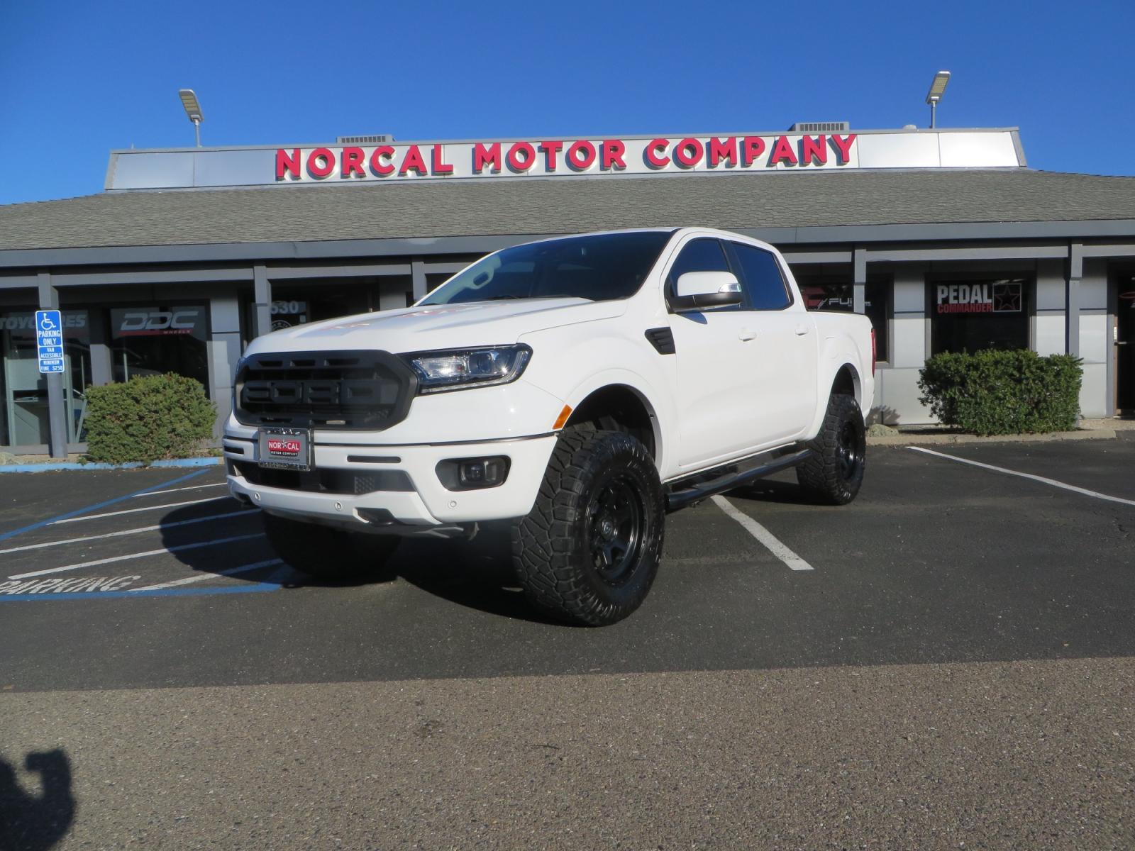 2019 White /Black Ford Ranger Lariat (1FTER4FHXKL) with an 2.3L engine, automatic transmission, located at 2630 Grass Valley Highway, Auburn, CA, 95603, (530) 508-5100, 38.937893, -121.095482 - Features a Fabtech suspension system, Fuel Offroad wheels, Nitto Ridge Grappler tires, Westin Running boards, and a Bakflip. - Photo #0